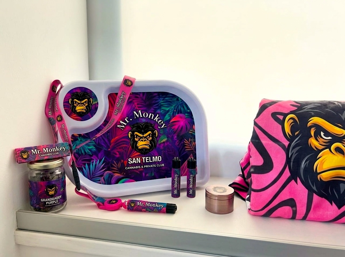 Mr. Monkey club items: branded tray, lanyards, lighters, grinder and bandana